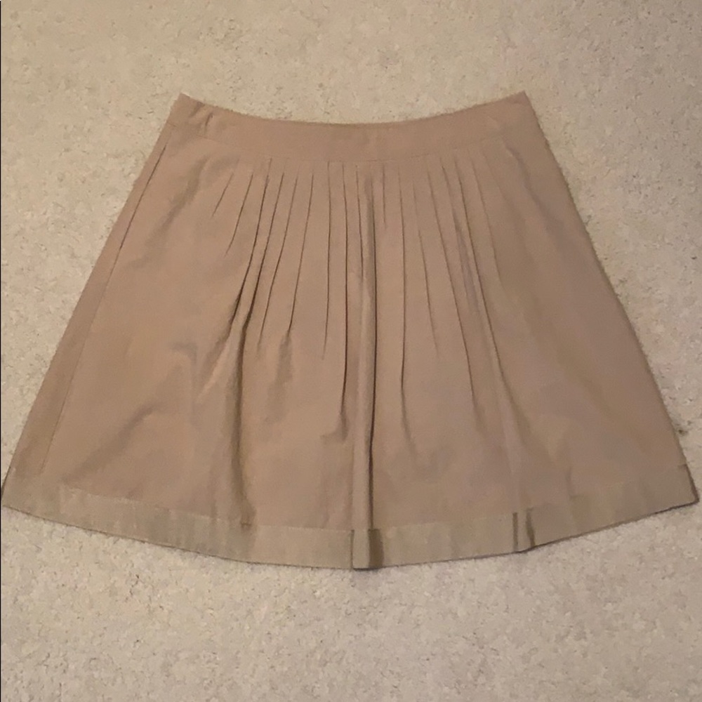 Khaki skirt with ribbon bottom hem